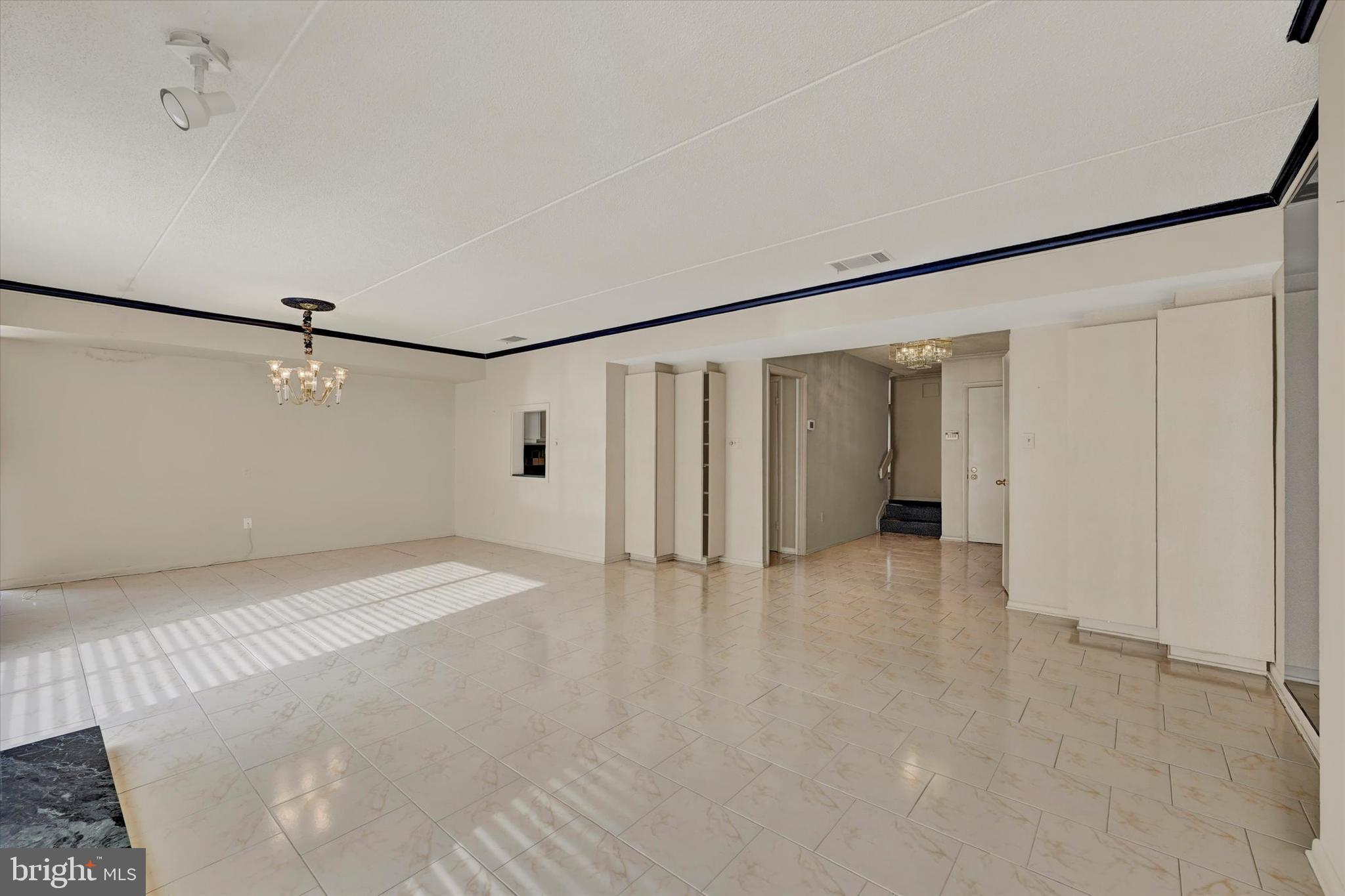 25 Tanner Court, Unit H Baltimore, MD 21208 - Photo 4 of 29 a view of an empty room