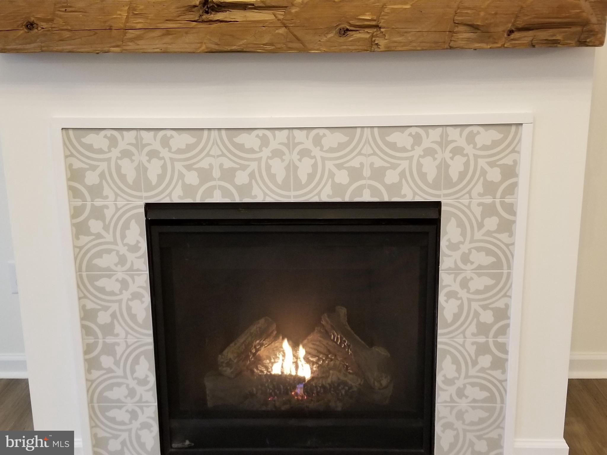 15740 Auburn Road Culpeper, VA 22701 - Photo 8 of 16 Wood mantle and tile surround