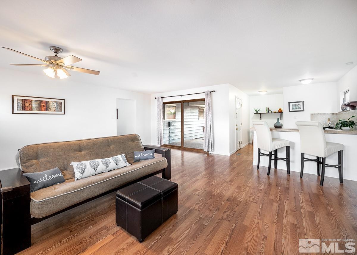 679 James Lane Reno, NV 89503 - Photo 14 of 25 a living room with furniture and wooden floor