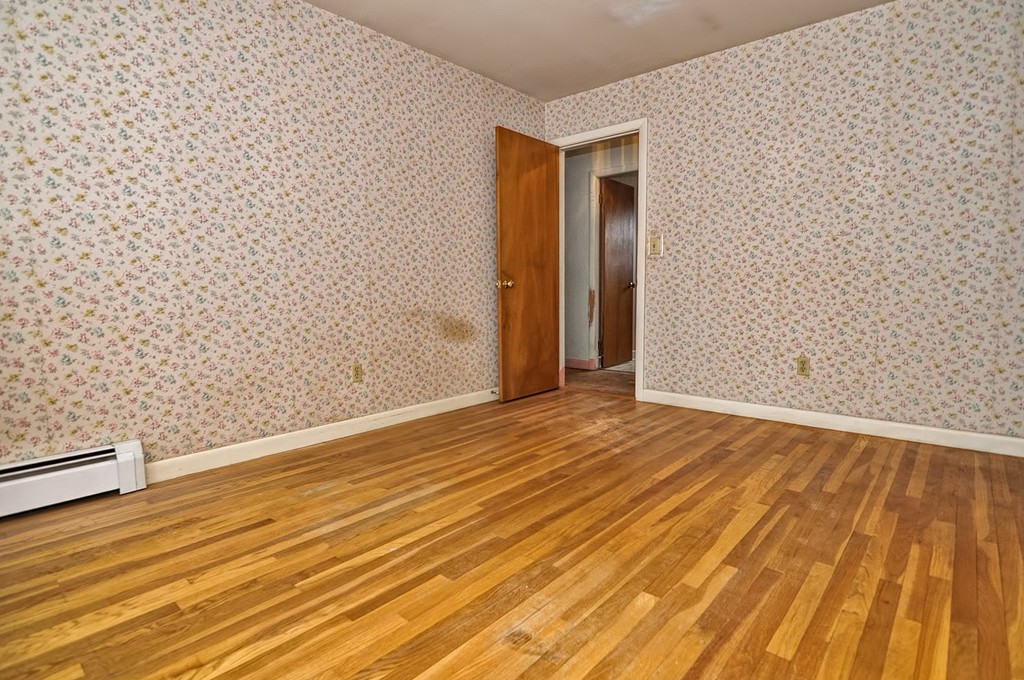 80 Goldthwaite Road Northbridge, MA 01588 - Photo 11 of 28 a view of an empty room with wooden floor and a sink