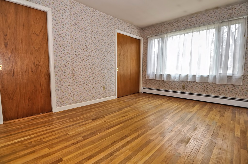 80 Goldthwaite Road Northbridge, MA 01588 - Photo 13 of 28 an empty room with wooden floor and windows