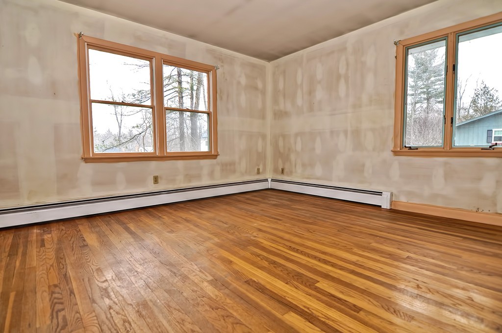 80 Goldthwaite Road Northbridge, MA 01588 - Photo 17 of 28 wooden floor in an empty room with a window