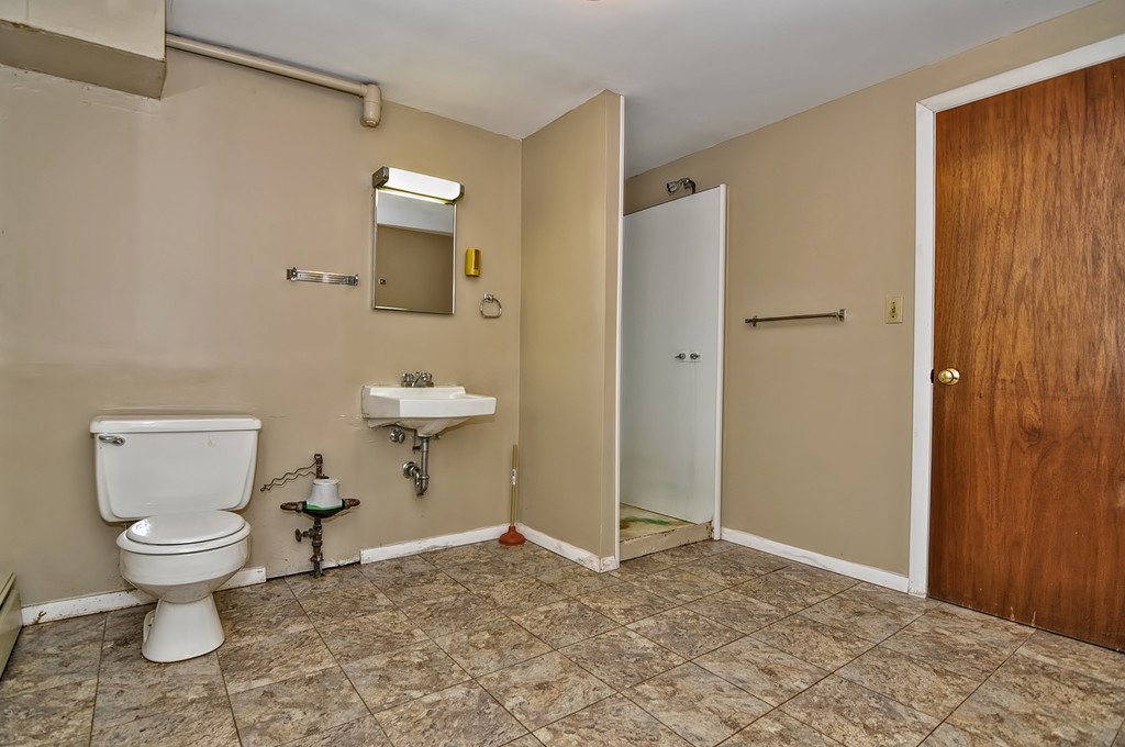 80 Goldthwaite Road Northbridge, MA 01588 - Photo 20 of 28 a bathroom view of a toilet sink and shower curtain