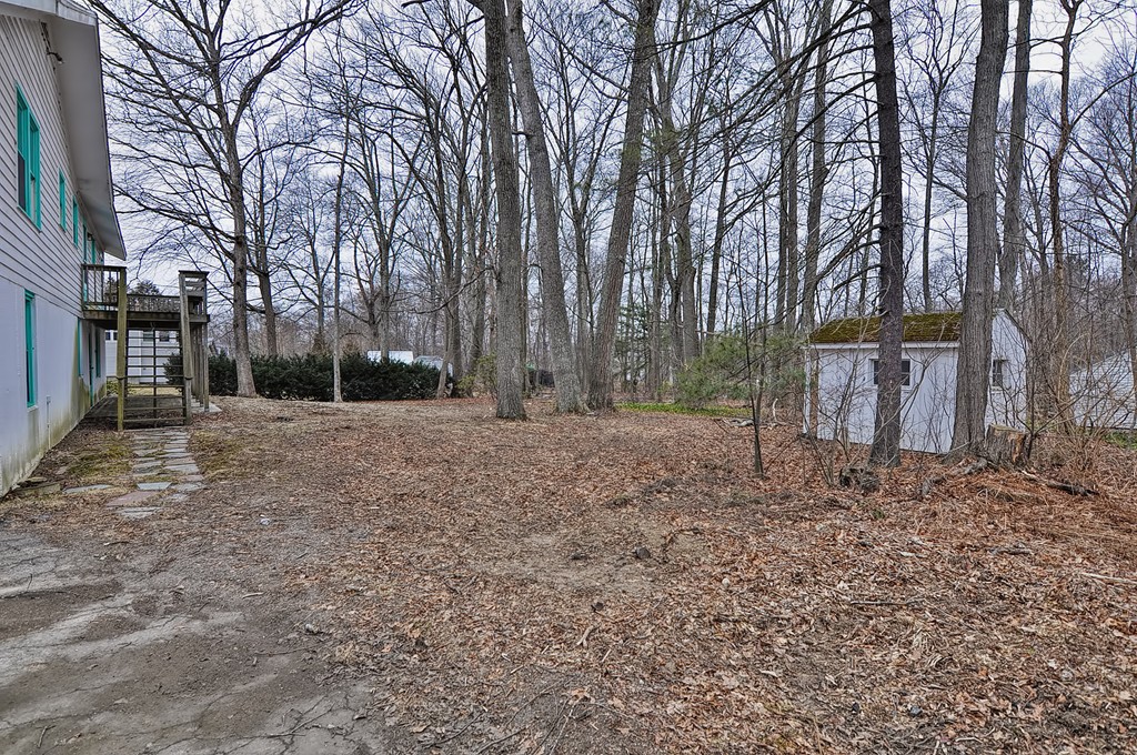 80 Goldthwaite Road Northbridge, MA 01588 - Photo 27 of 28 a backyard of a house with lots of green space