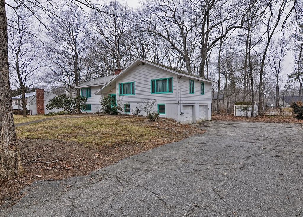 80 Goldthwaite Road Northbridge, MA 01588 - Photo 3 of 28 a view of a house with a yard covered in snow