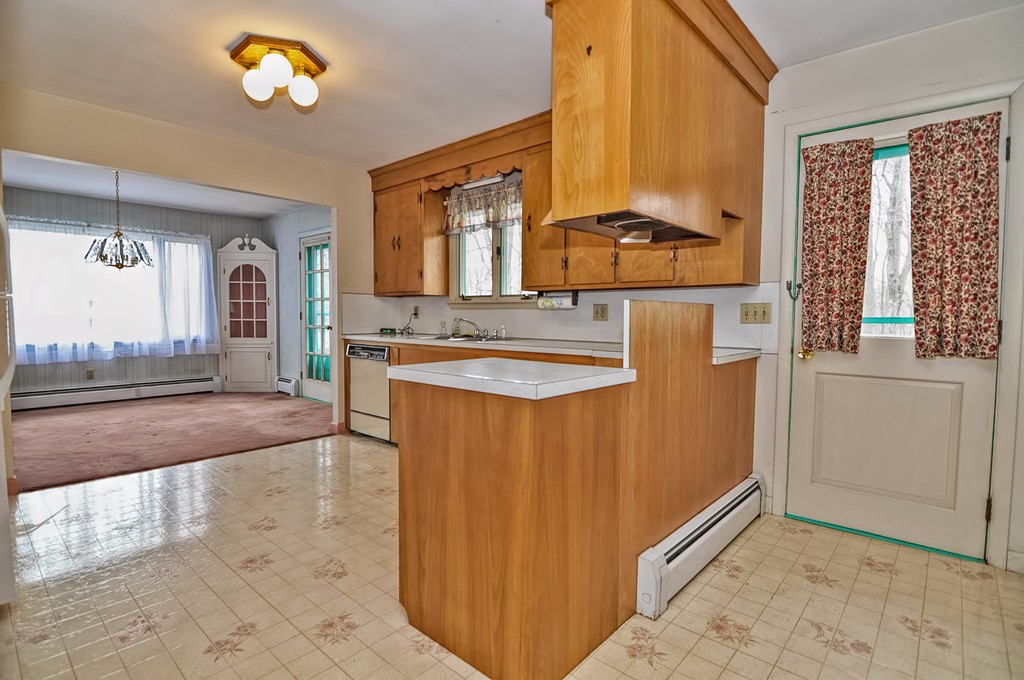 80 Goldthwaite Road Northbridge, MA 01588 - Photo 5 of 28 a view of a bathroom with a sink and a mirror
