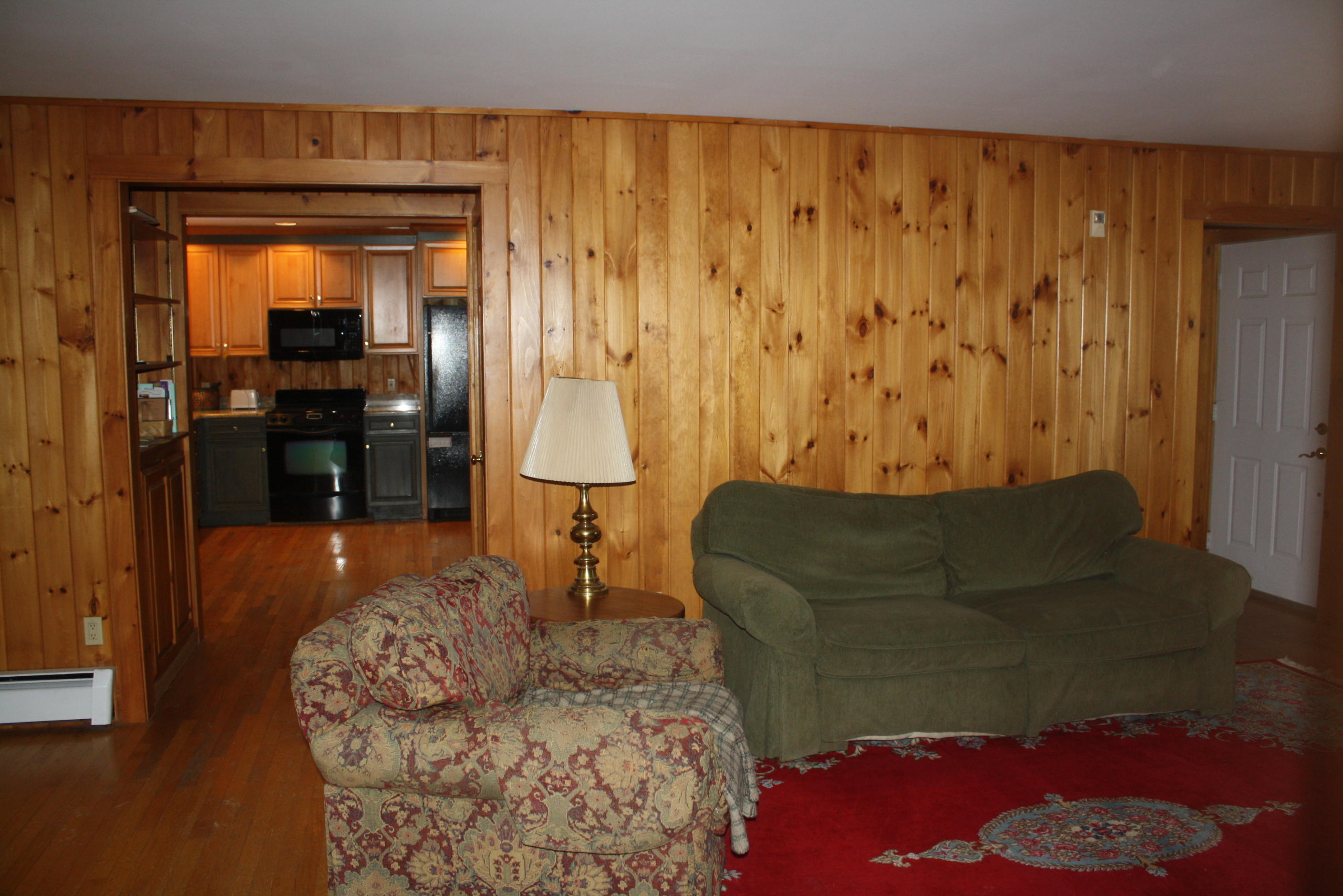 174 Mingo Loop Road Rangeley, ME 04970 - Photo 23 of 50 LR into KIT
