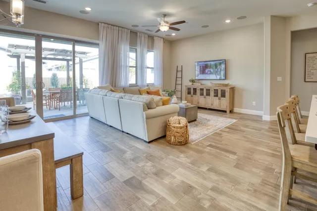 a spacious bedroom with a bed and window
