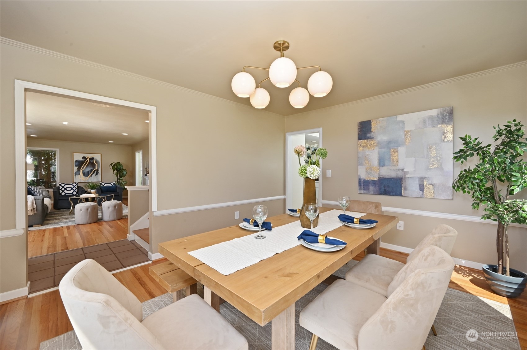 2602 29th Avenue West Seattle, WA 98199 - Photo 8 of 39 a view of a dining room with furniture and wooden floor