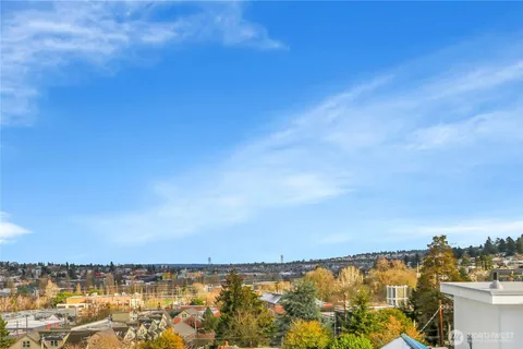 a view of city with tall buildings