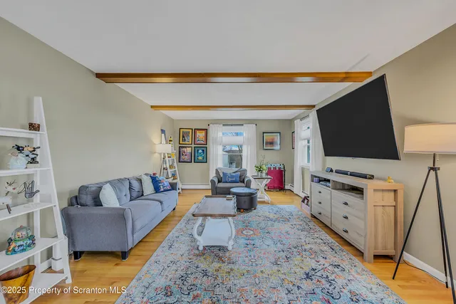 a kitchen with stainless steel appliances a refrigerator sink and microwave