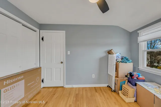 a bedroom with a bed and furniture