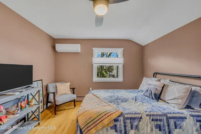 a utility room with dryer washer and a fridge