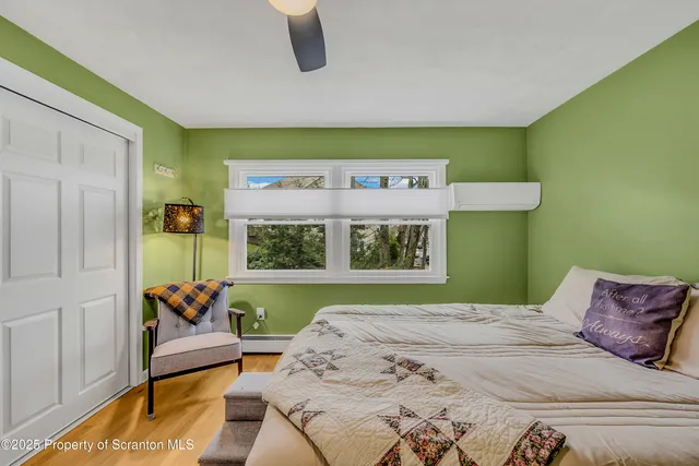 a room with furniture and a flat screen tv