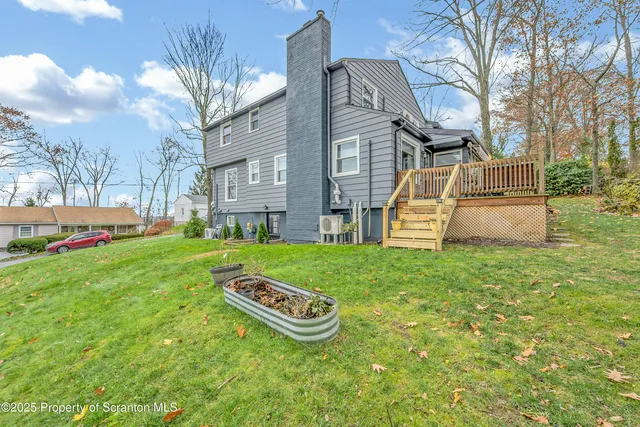 a view of a park with iron fence