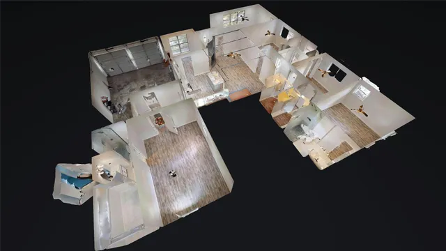 a view of backyard from deck having patio