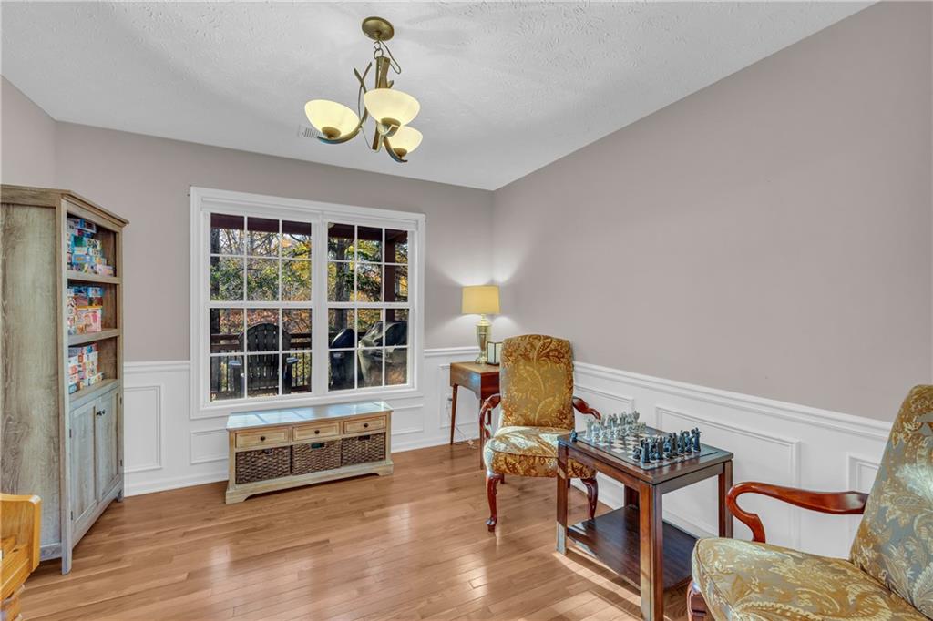 1670 Alcovy River Drive Dacula, GA 30019 - Photo 11 of 43 a dining room with furniture and a window