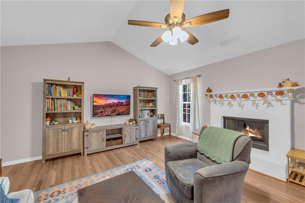 1670 Alcovy River Drive Dacula, GA 30019 - Photo 15 of 43 a living room with furniture and a flat screen tv