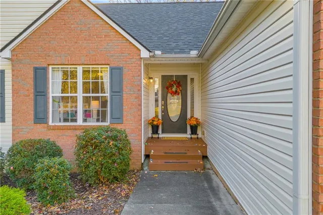 a front view of a house with a porch
