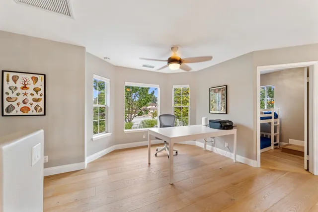 a playing room with furniture and toys