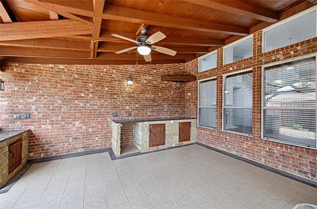 a view of empty room with windows