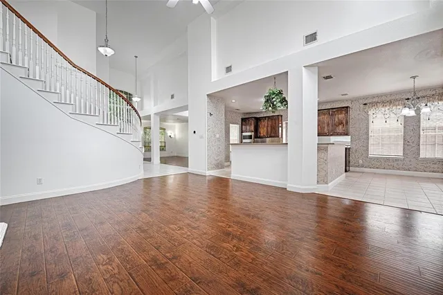 a view of an entryway with wooden floor