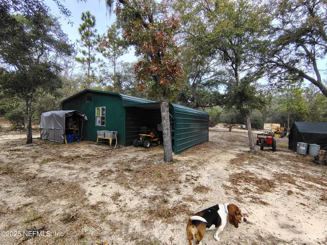 a house view with a car park