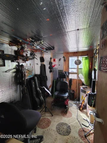 a view of a yard with a tree