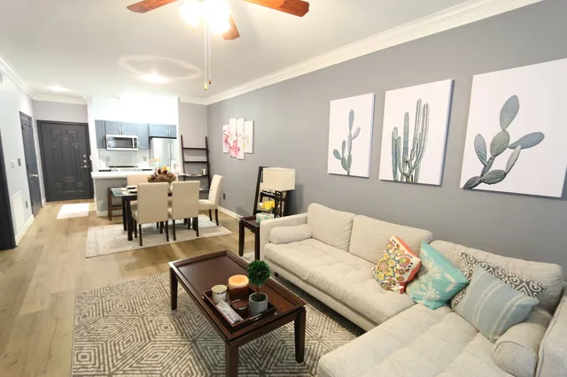 a living room with furniture and a window