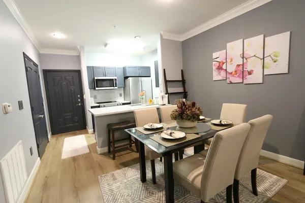 a view of a dining room with furniture