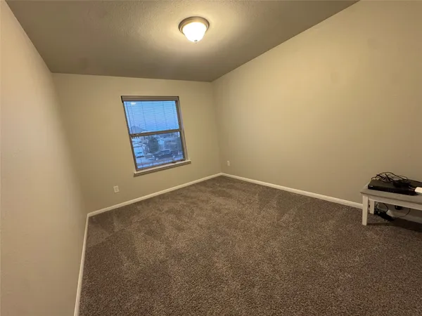 an empty room with a workbench