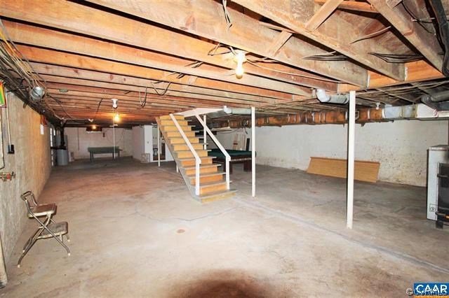 150 Bibb Store Road Louisa, VA 23093 - Photo 19 of 25 a view of a room with wooden shelves