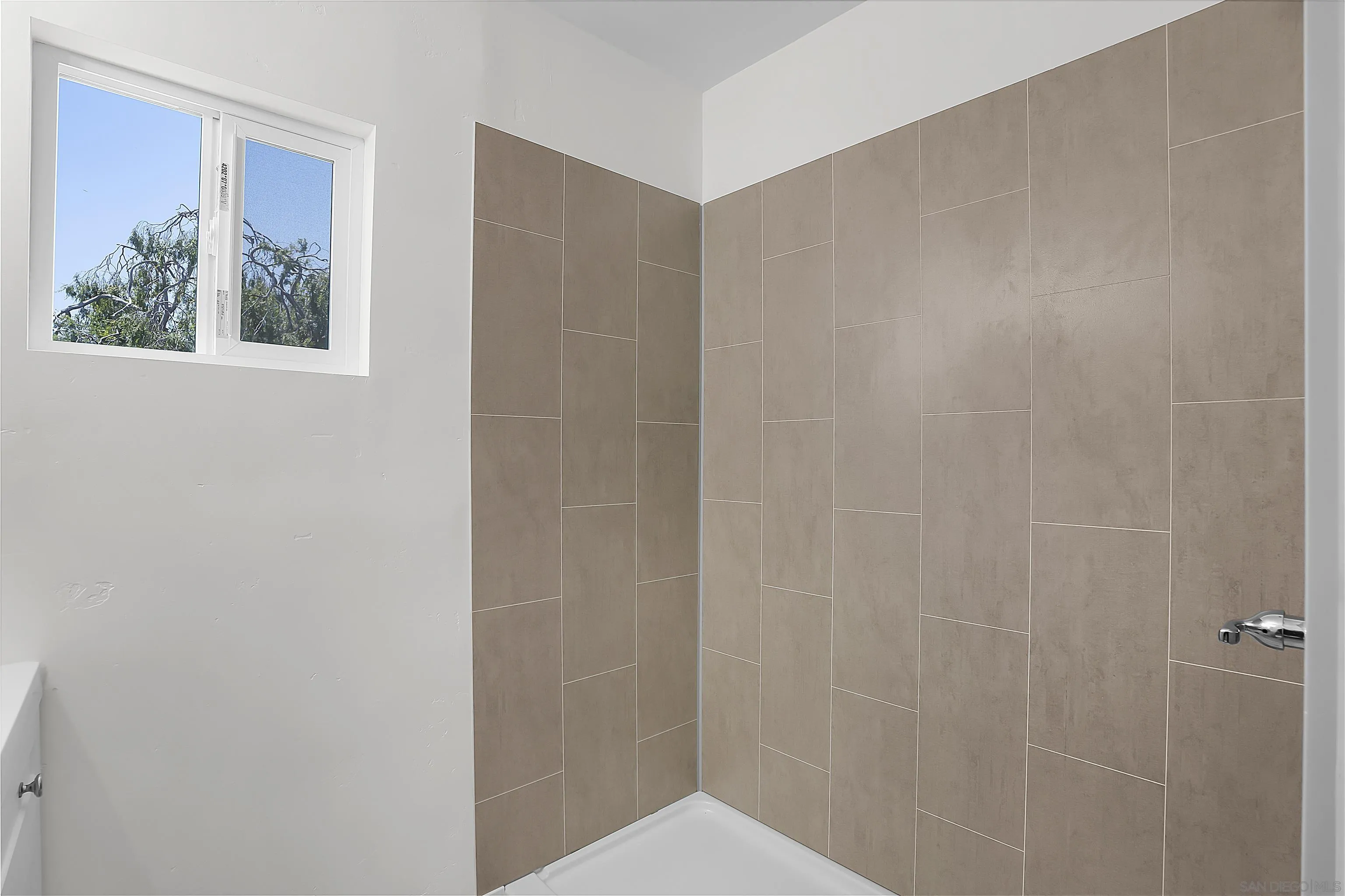 620 Elm Avenue Chula Vista, CA 91910 - Photo 12 of 30 a bathroom with a shower and a toilet