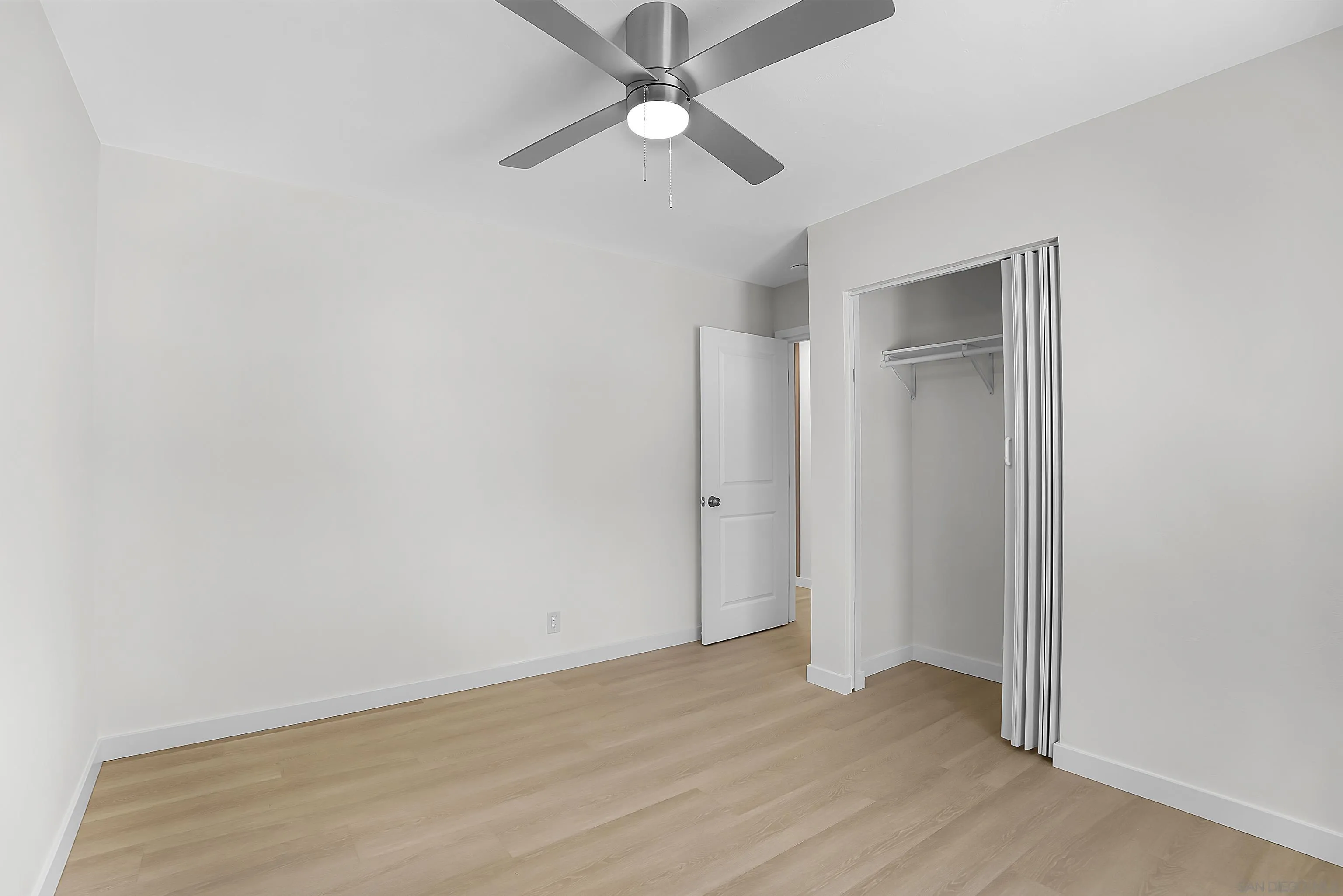 620 Elm Avenue Chula Vista, CA 91910 - Photo 18 of 30 an empty room with closet and a ceiling fan