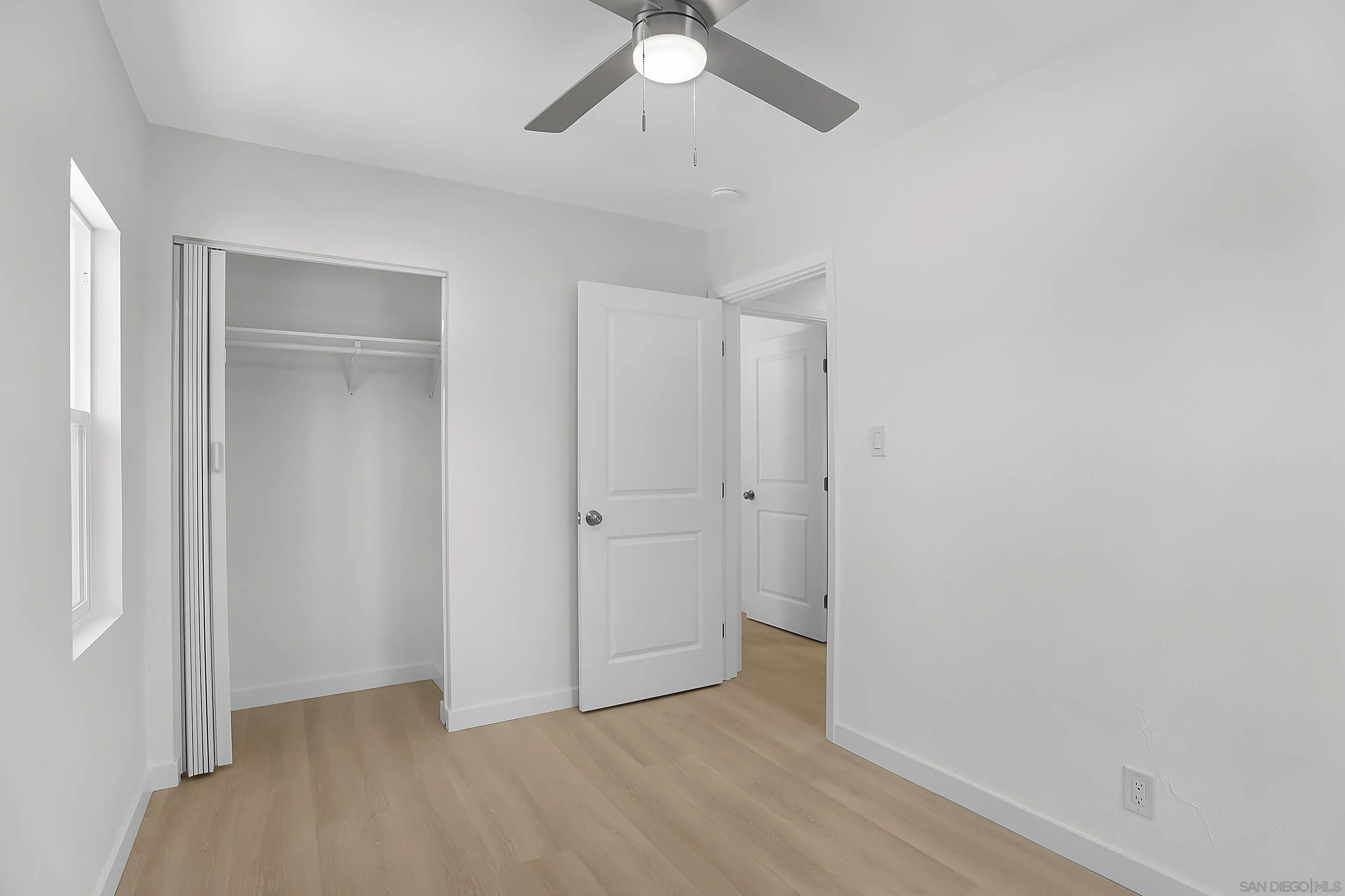 620 Elm Avenue Chula Vista, CA 91910 - Photo 21 of 30 a view of an empty room and chandelier fan