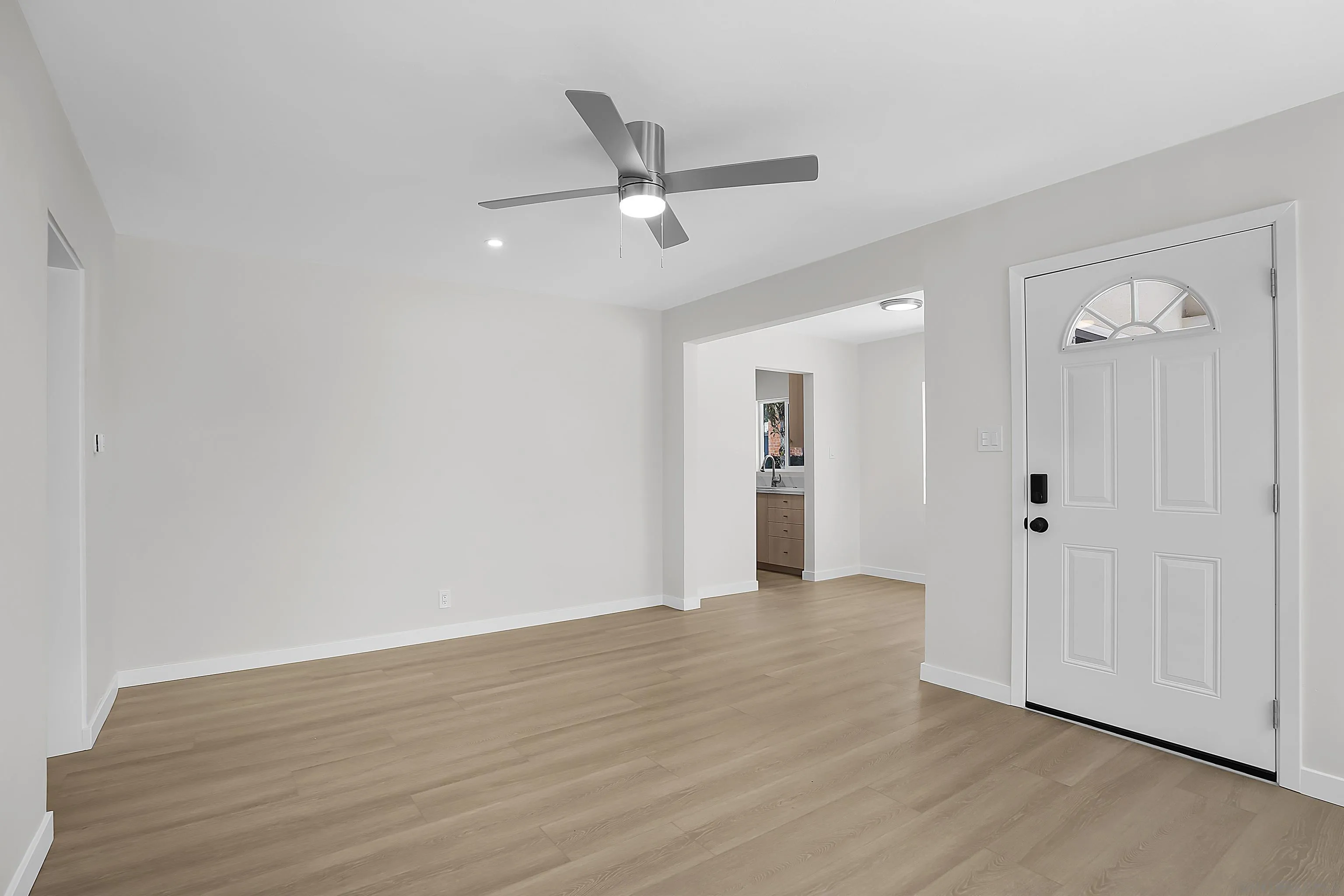 620 Elm Avenue Chula Vista, CA 91910 - Photo 5 of 30 an empty room with wooden floor and windows