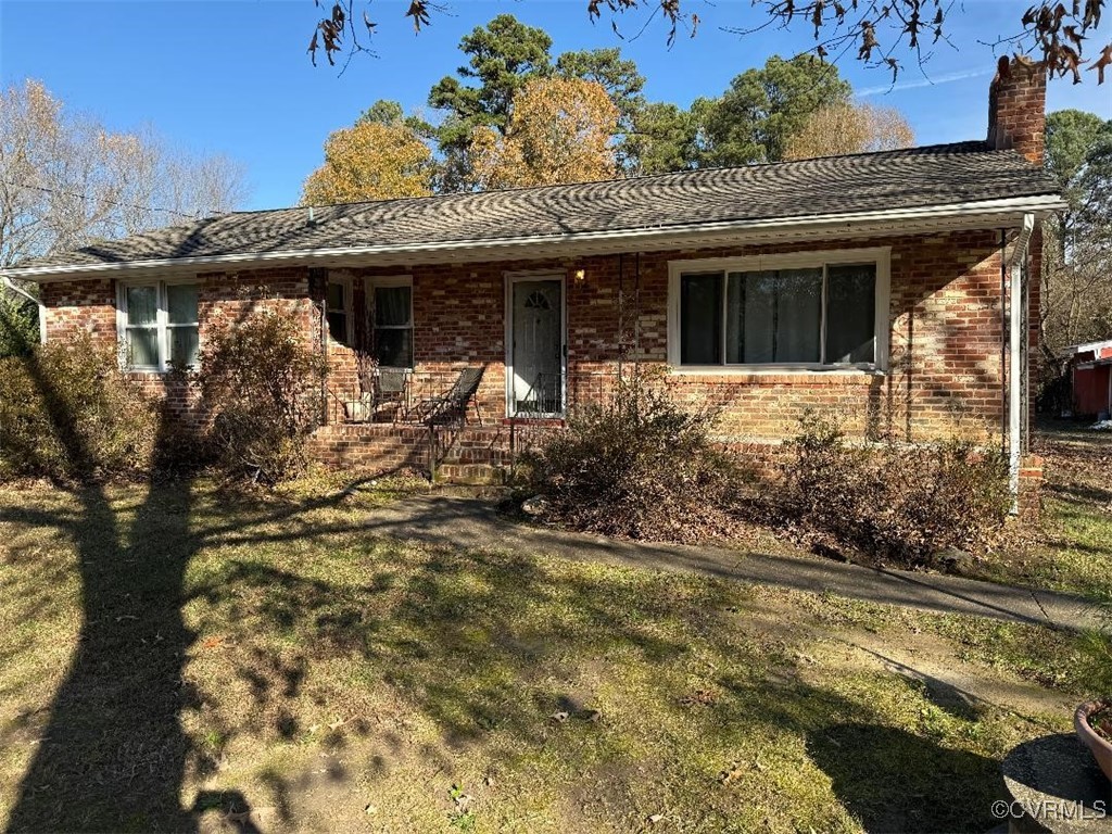 8155 Varina Road Henrico, VA 23231 - Photo 1 of 6 Ranch-style home featuring a front lawn