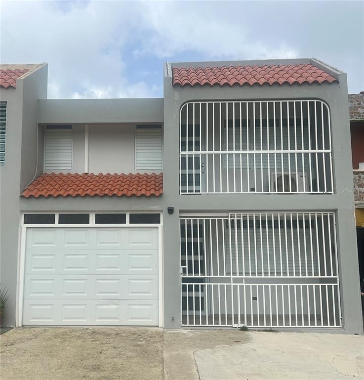 8 Mundo Plaza Ceiba, PR 00735 - Photo 1 of 1 a view of a brick house with a window