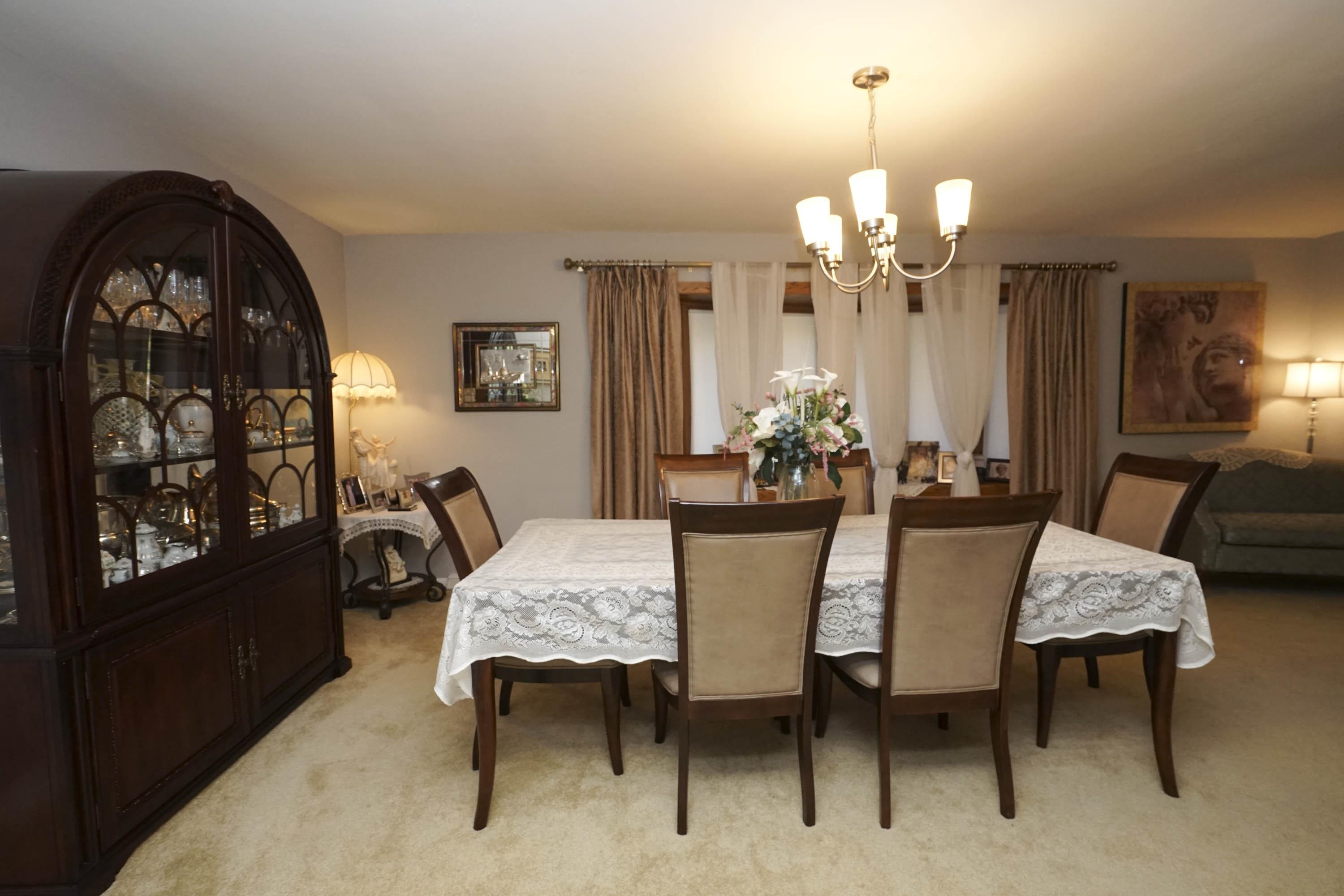 2707 Spring Creek Road Rockford, IL 61107 - Photo 8 of 44 a dining room with furniture and window