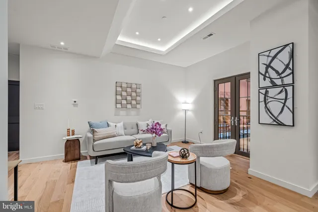 a living room with furniture and a table