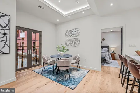 a living room with furniture and a table