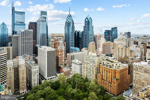 a view of a city with tall buildings