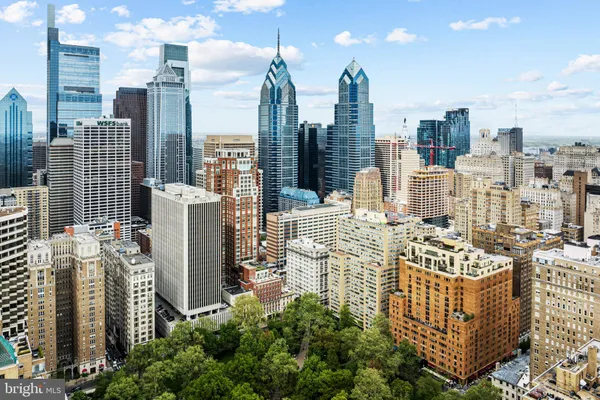 a view of a city with tall buildings