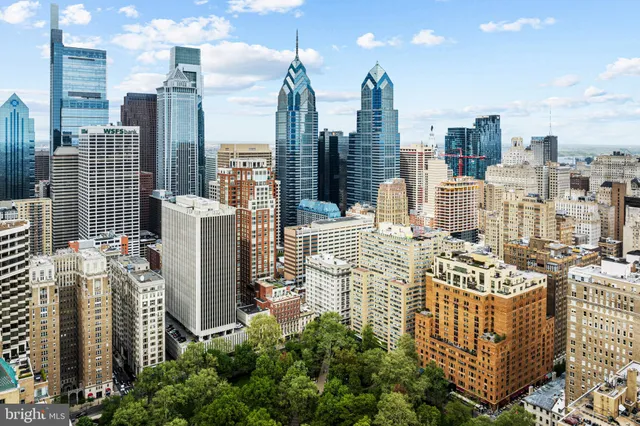 a view of a city with tall buildings