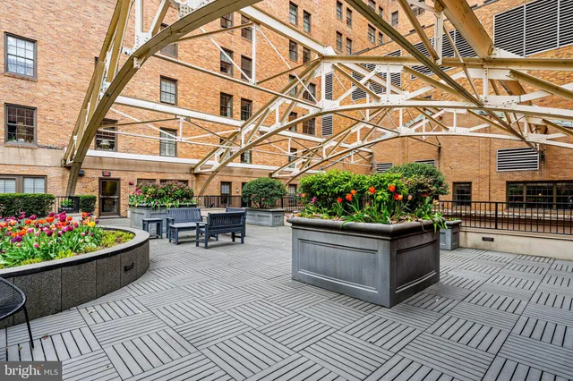 a view of a dining room with furniture and window