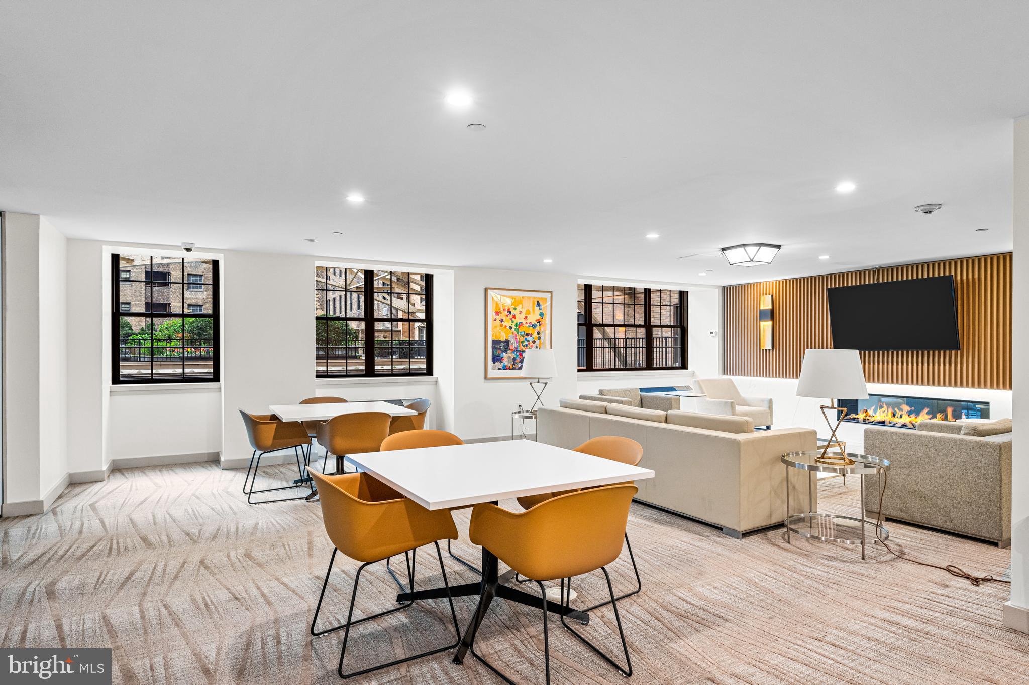 219 South 18th Street, Unit 309 Philadelphia, PA 19103 - Photo 43 of 44 a living room with furniture and a flat screen tv