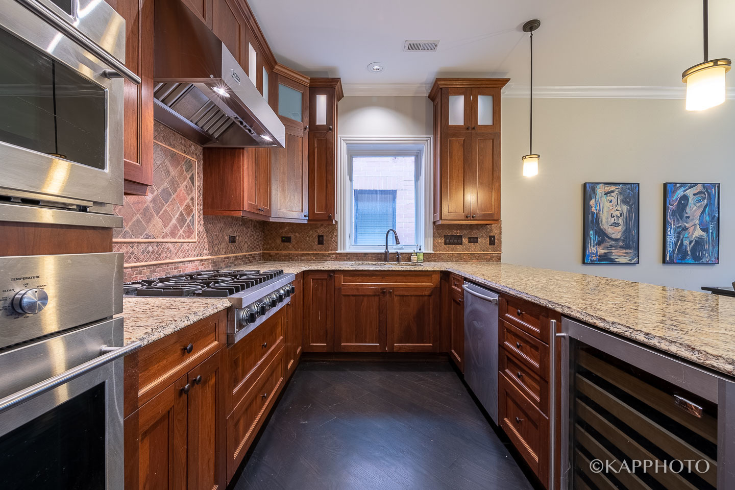 106 South Sangamon Street, Unit 3N Chicago, IL 60607 - Photo 11 of 27 a kitchen with stainless steel appliances granite countertop a stove and a sink