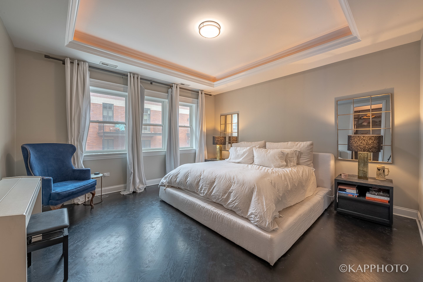 106 South Sangamon Street, Unit 3N Chicago, IL 60607 - Photo 14 of 27 a bedroom with a bed and a chair