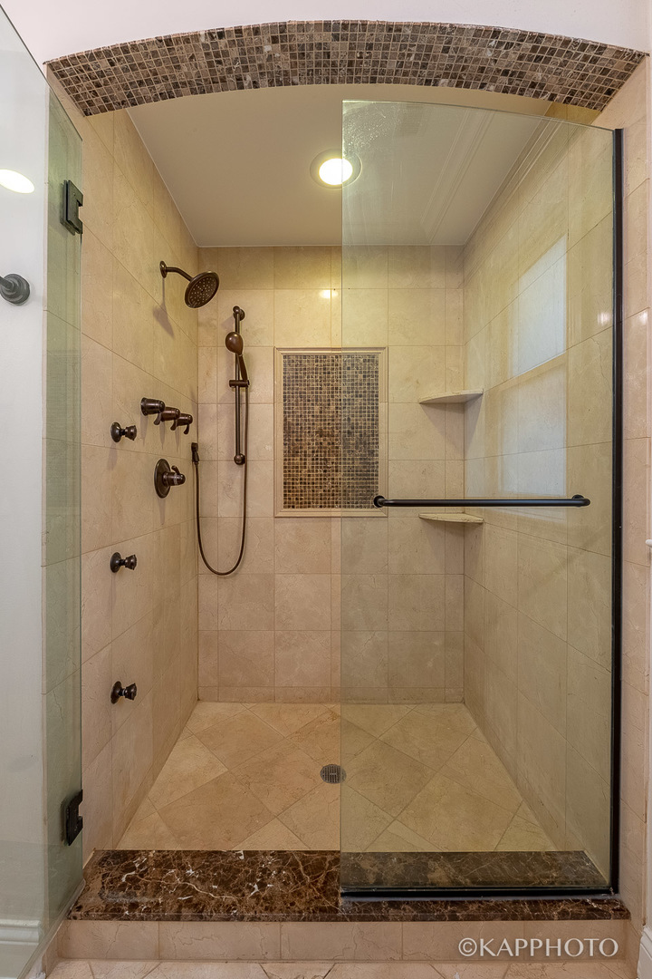 106 South Sangamon Street, Unit 3N Chicago, IL 60607 - Photo 20 of 27 a bathroom with a shower