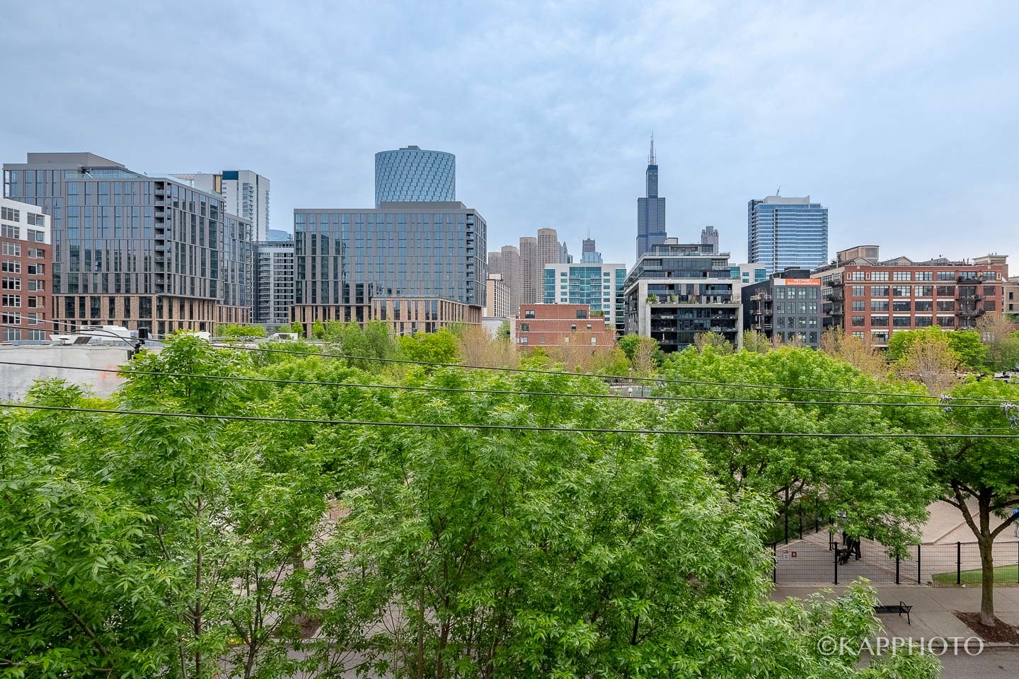 106 South Sangamon Street, Unit 3N Chicago, IL 60607 - Photo 8 of 27 a view of a city with tall buildings